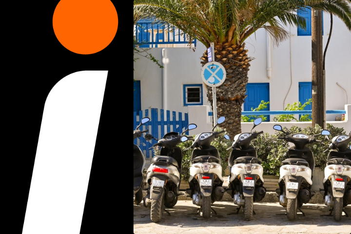 electric scooters parked outside of a hotel in Greece