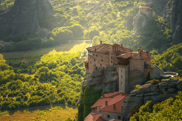 meteora a monastery at the edge of a hill